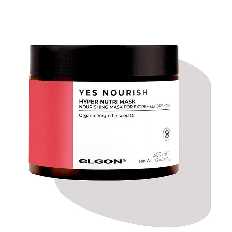 Maschera per capelli secchi in vasetto ambra basso e schiacciato con tappo nero. Etichetta metà rossa metà bianca.