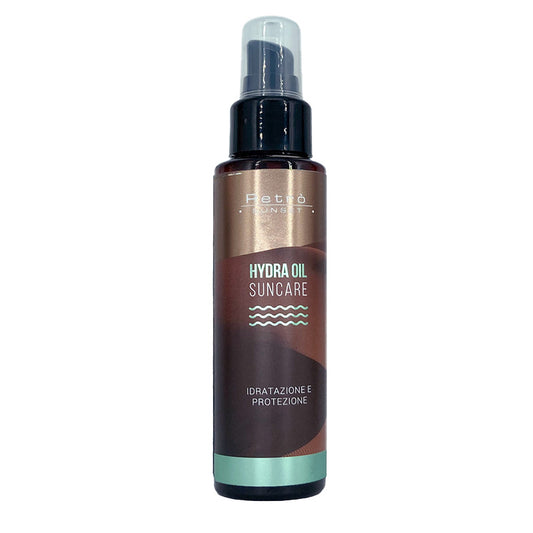 Flacone da 100ml ambra con tappo dispenser nero e cappuccio trasparente.