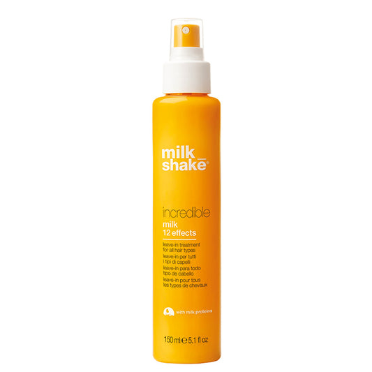 Flacone giallo con tappo spray e cappuccio trasparente.