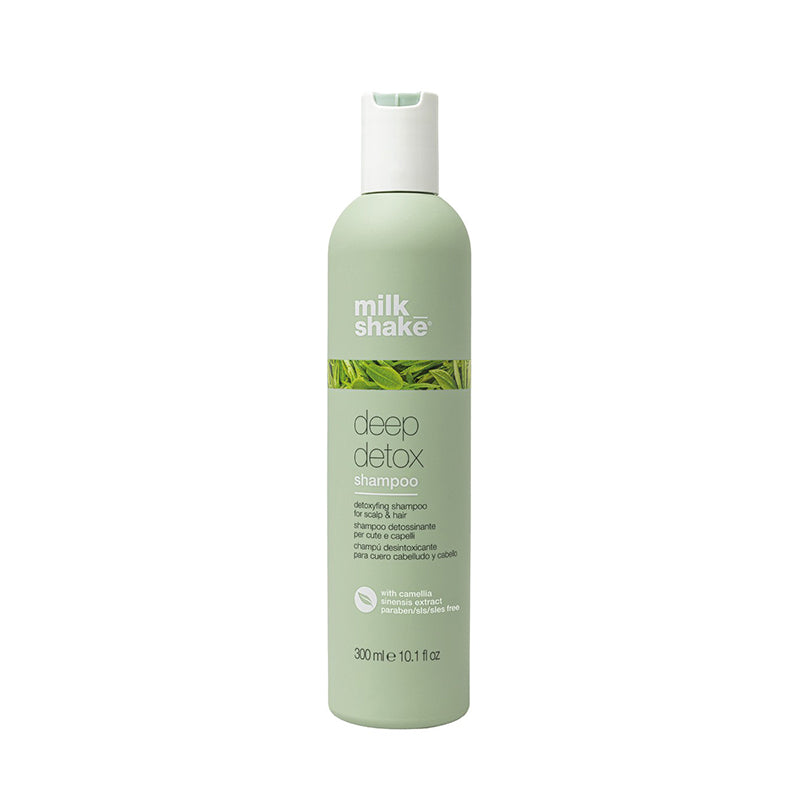 Flacone verde con tappo flip top bianco. Piccola immagine con delle erbe  sulla parte frontale.