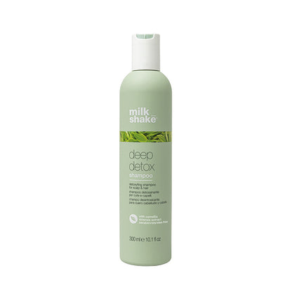 Flacone verde con tappo flip top bianco. Piccola immagine con delle erbe  sulla parte frontale.